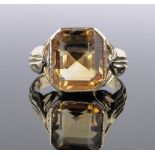 A large 18ct gold square-cut citrine set signet ring, setting height 15mm, 14.5g, size Z+.