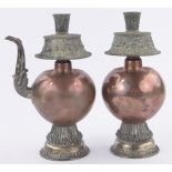A pair of Tibetan copper and silver overlay pots, with finely chased and cast mounts, height 24cm.
