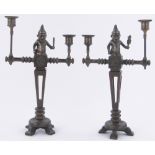 Pair of bronze and carved wood Mr Punch design twin branch candelabra, circa 1900, height 37cm.