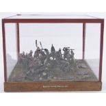 A Zulu War battle scene diorama, with painted lead figures, in glazed display case, width 26cm.