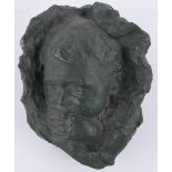 F George- painted plaster sculpture, infant head, length 30cm.