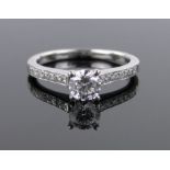 An 18ct white gold solitaire diamond ring, approx. 0.