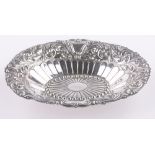A late Victorian oval silver bread bowl, with relief acanthus embossed border, makers marks J N M,