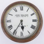 A Victorian oak cased dial wall clock, possibly a railway station clock, dial signed John Walker,
