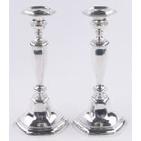 A pair of modern sterling silver candlesticks, height 25cm.