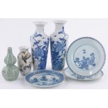 A group of Oriental porcelain items, including a pair of blue and white painted vases, height 29cm,