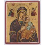 A reproduction Greek painted and gilded wood icon, 26cm x 22cm.