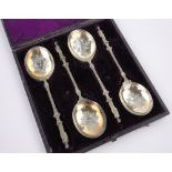 A cased set of 4 large Garrard cast silver gilt serving spoons,