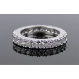 An 18ct white gold diamond eternity ring, total diamond content approx.