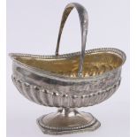 A 19th century Russian silver swing handled table centre fruit bowl, Russian hallmarks, length 18cm,