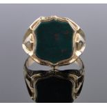 A 15ct gold bloodstone shield shaped signet ring, hallmarks Chester 1888, setting height 18mm,