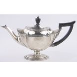 An Edwardian silver teapot, of shaped oval form, London 1902, 13.5 oz.