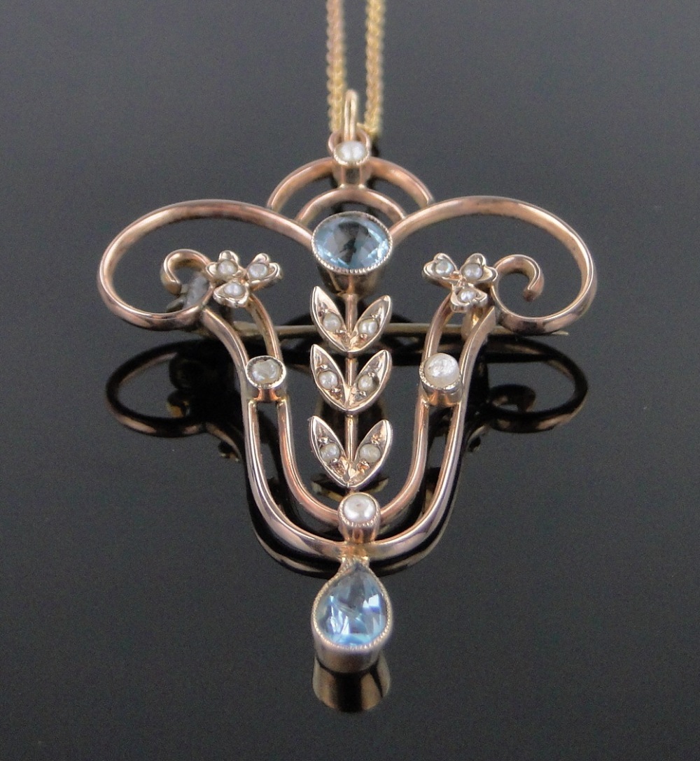 An Edwardian aquamarine and pearl set openwork pendant/brooch, unmarked gold settings, - Image 4 of 4