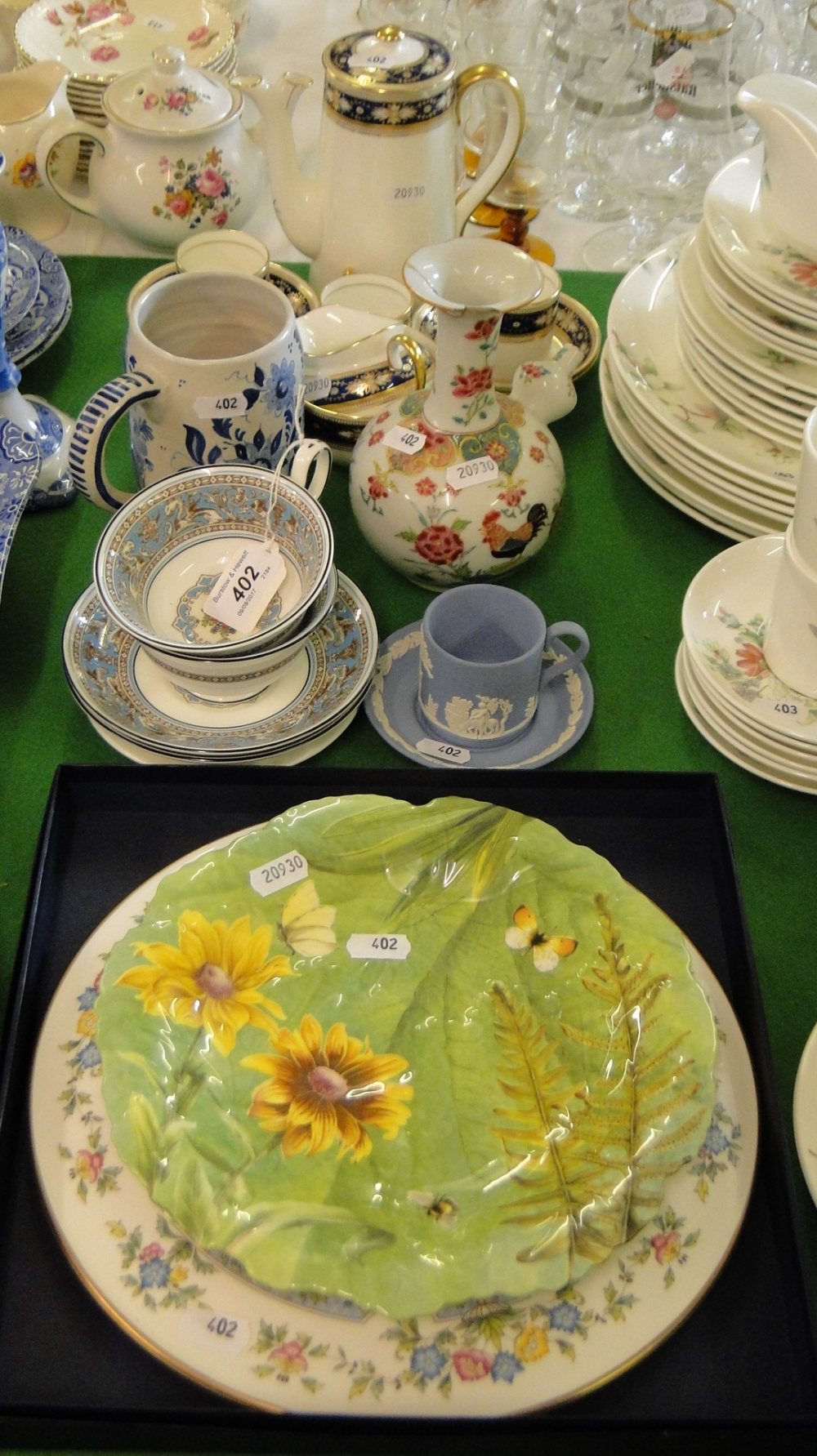 A Royal Worcester cake stand, Wedgwood cups and saucers, coffeeware, etc.