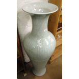 A floor standing Oriental crackle glazed vase.