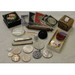 A magnifying glass, a Russian box, enamelled badge, coins, etc.