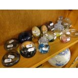 Various paperweights including Caithness and a scent bottle.