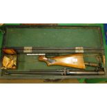 A cased B S A air rifle with tools, etc.