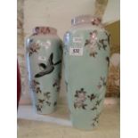 Pair of Oriental painted milk glass vases with blossom and bird design.