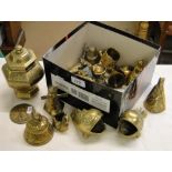 Small brass bells, brass pot and ornaments.