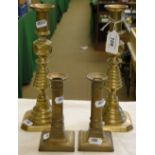 2 Pairs of turned brass candlesticks.