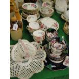 Various floral decorated teaware and Victorian teaware with butterfly decoration.