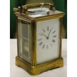 A French brass cased carriage clock with repeat movement