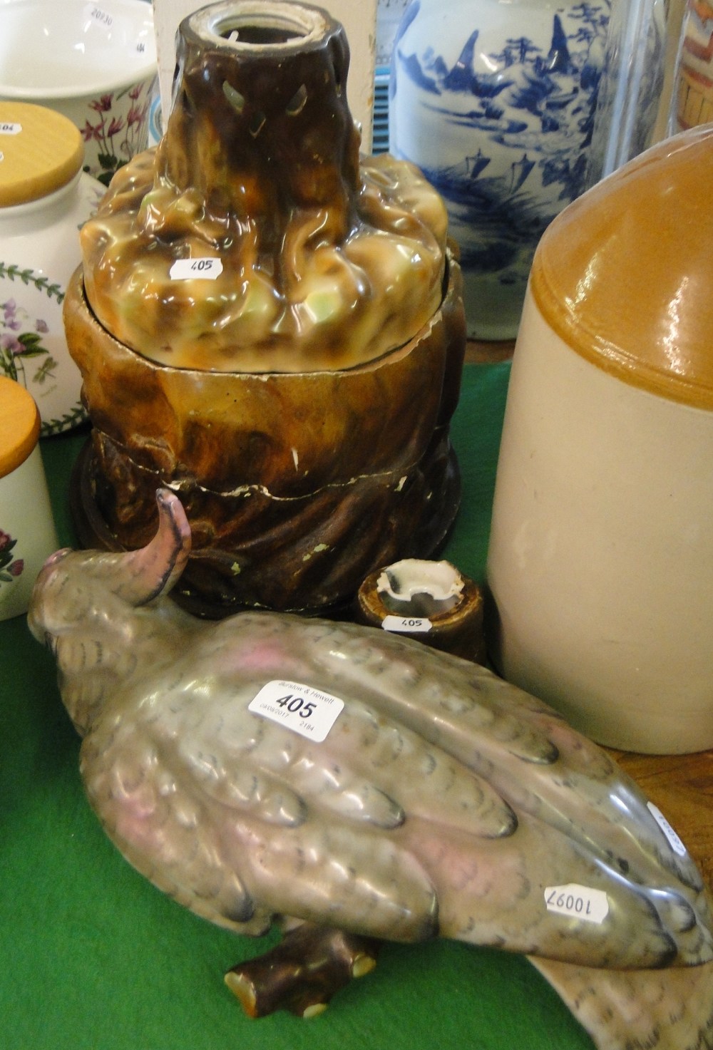 A large continental porcelain parrot on stand for re-assembly.