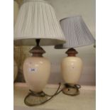 A pair of crackle glazed table lamps and shades.