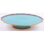A Victorian Minton's Majolica lazy-Susan, turquoise ground with coloured shaped coloured border,