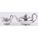 A George IV silver teapot and matching cream jug,