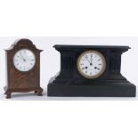 A small Edwardian carved mahogany cased mantel clock, height 23cm and a Victorian slate cased clock,