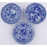 3 Similar Chinese blue and white transfer decorated bowls, with scalloped edges, diameter 31cm, (3).
