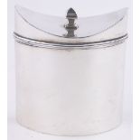 An Edwardian oval silver tea caddy, with concave hinged lid, Chester 1909, height 8cm, 3.6 oz.