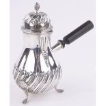 A Victorian silver chocolate pot with side pouring handle,