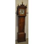 A 19th century 8 day oak long case clock, with 10" square dial inscribed "In Sutton Fecit",
