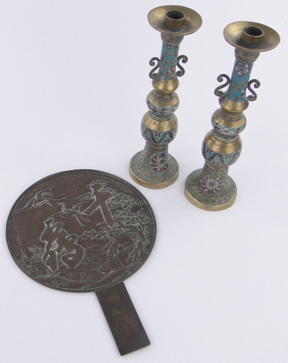 A pair of 19th century Chinese bronze and champleve enamel candlesticks, height 30cm,