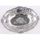 A continental silver basket, relief embossed cherub design, marked 800, length 20cm, 4 oz.