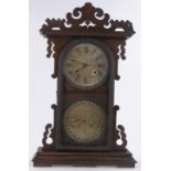 An unusual 19th century continental walnut cased mantel clock, with secondary full calendar dial,