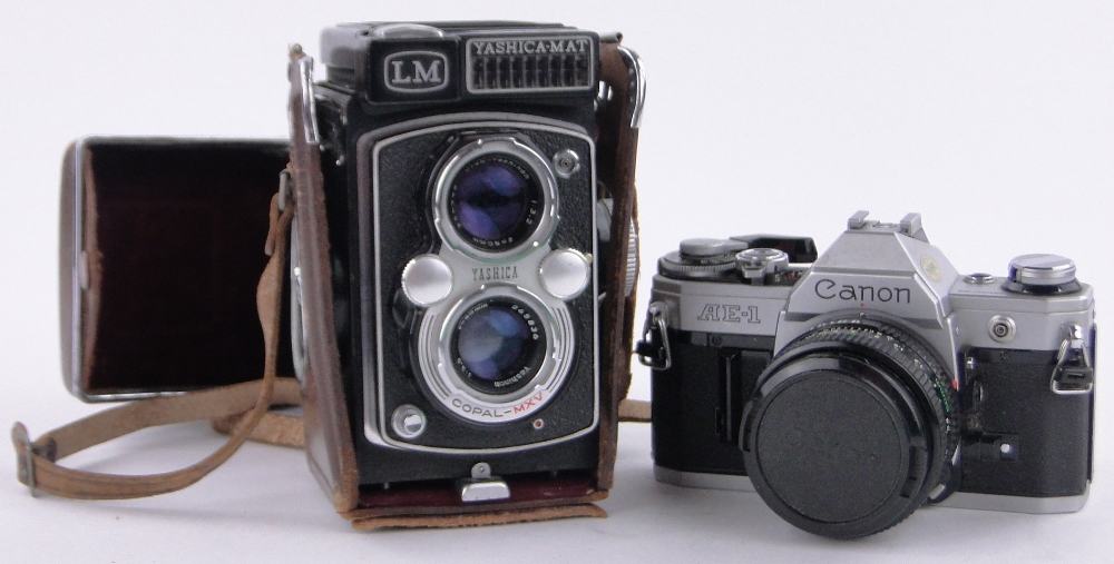 A Yashica LM twin lens reflex camera, leather cased.