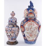 2 Oriental Imari porcelain jars and covers, hand-painted blue, red and gilt designs,