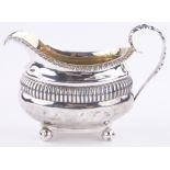 A George III silver cream jug, by Joseph Angel, London 1819, 5.5 oz.