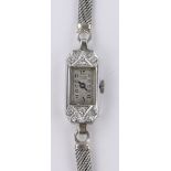 A lady's J W Benson platinum and diamond cocktail wristwatch, 9ct white gold strap, case width 10mm.