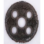 A finely carved and pierced 19th century Chinese wooden frame,