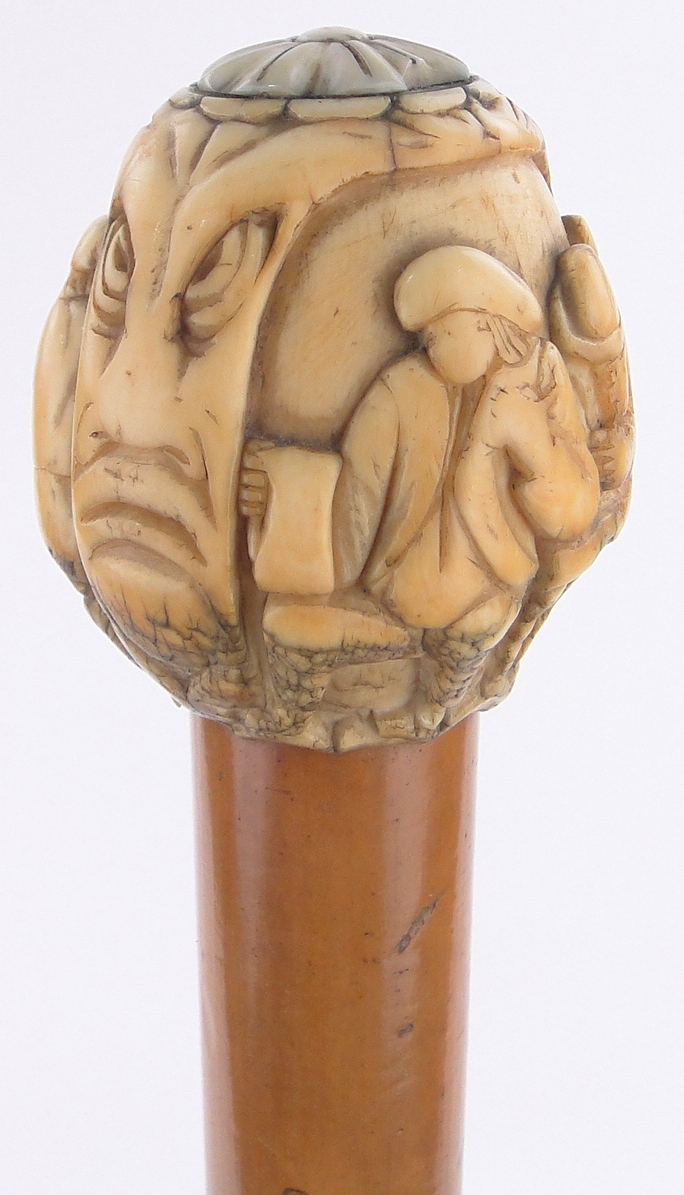 An 18th/19th century ivory handled Malacca walking stick,