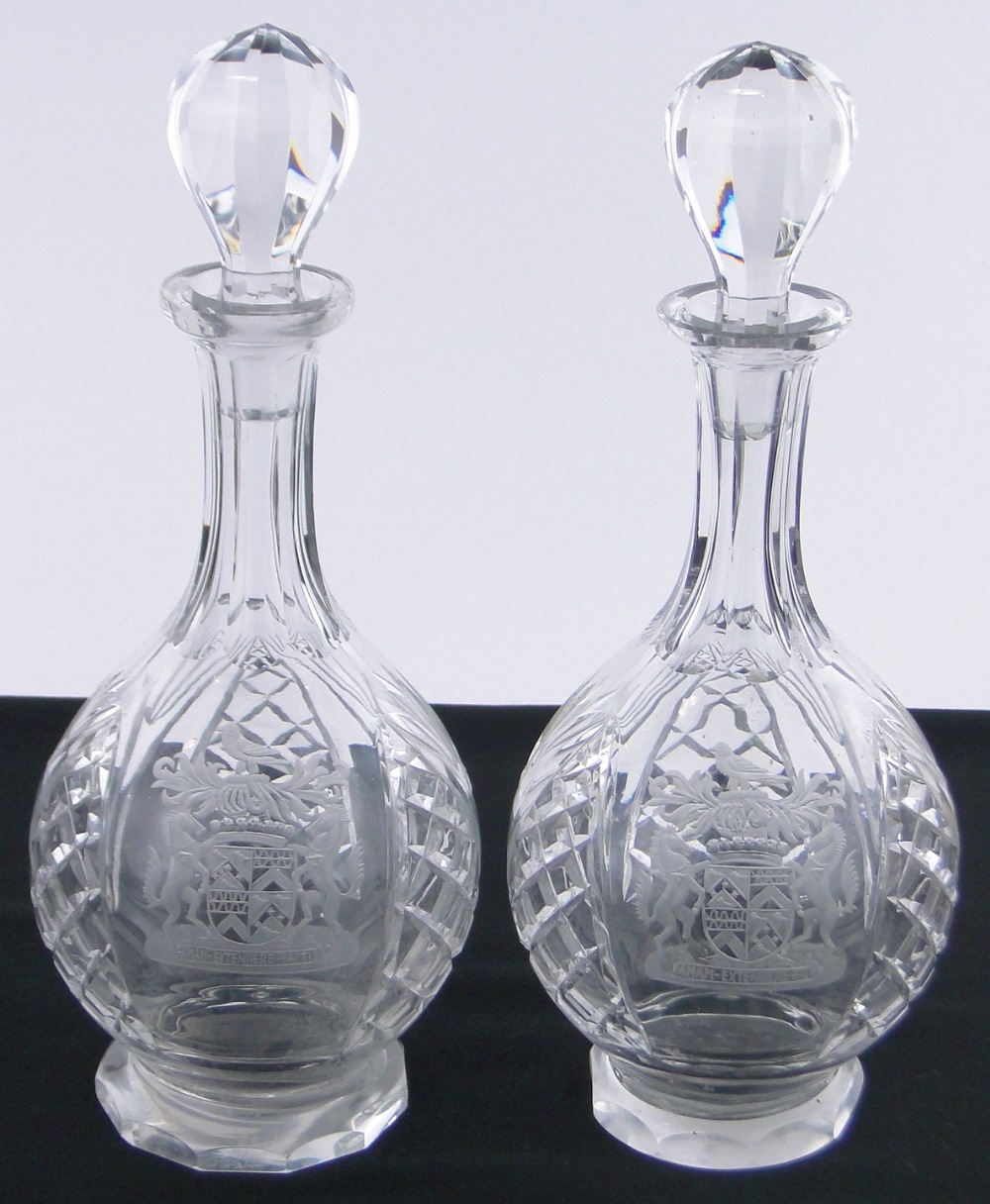 A pair of 20th century cut-glass decanters and stoppers,