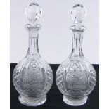 A pair of 20th century cut-glass decanters and stoppers,