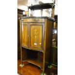 A late Victorian rosewood bow front side cabinet, with raised mirror back,