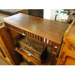 A mahogany rectangular console table with fluted legs.