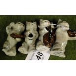 A set of 4 miniature Beswick cat musicians.